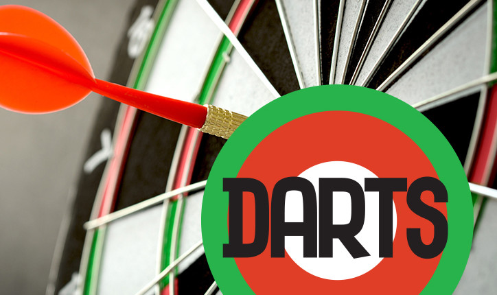 Right on target concept using dart in the bullseye on dartboard